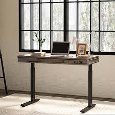 Classy Height Adjustable Standing Desk with 3 USB ports for your convenience. Large Drawer. Smooth Movement up and down with Basic Keypad.Desktop 47.6" (W) x 23.6"(D).