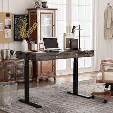  Classy Height Adjustable Standing Desk with 3 USB ports for your convenience. Large Drawer. Smooth Movement up and down with Basic Keypad.Desktop 47.6" (W) x 23.6"(D).